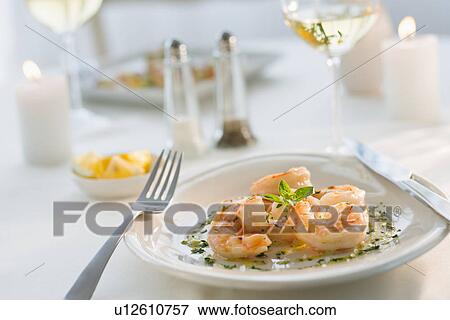 Stock Photo - Seafood on plate in restaurant. Fotosearch