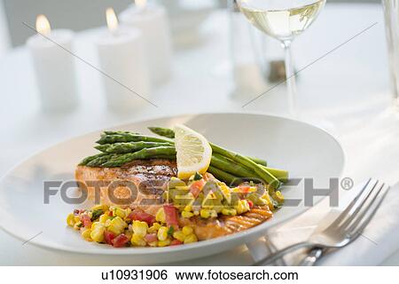 Stock Photograph - Seafood on plate in restaurant. Fotosearch