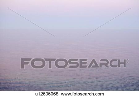 Stock Photo - Seascape at dusk. Fotosearch