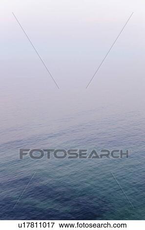 Stock Photo - Seascape at dusk. Fotosearch