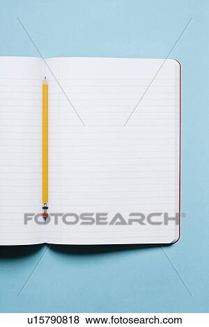 Single yellow sharpened pencil with blank composition notebook View Large Photo Image Stock Photo - Single yellow sharpened pencil with blank composition notebook. Fotosearch