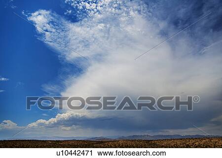 Stock Image - Sky above canyon. Fotosearch