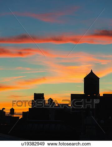 Stock Photo - Skyline at sunset. Fotosearch
