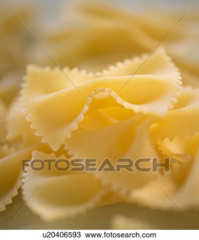 Stock Image - Studio Shot of bow tie pasta. Fotosearch