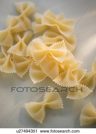 Studio Shot of bow tie pasta View Large Photo Image Stock Image - Studio Shot of bow tie pasta. Fotosearch