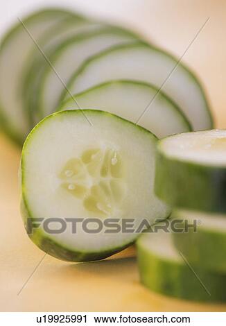 Stock Image - Studio shot of cucumber. Fotosearch