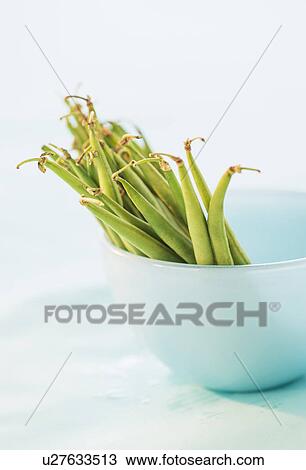 Stock Image - Studio shot of french green beans. Fotosearch