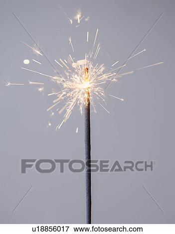 Studio shot of sparkler View Large Photo Image Stock Photo - Studio shot of sparkler. Fotosearch