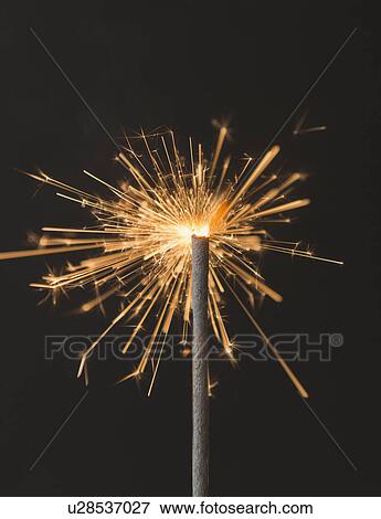 Stock Photo - Studio shot of sparkler. Fotosearch