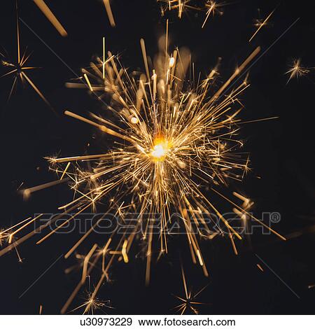 Studio shot of sparkler View Large Photo Image Stock Photo - Studio shot of sparkler. Fotosearch