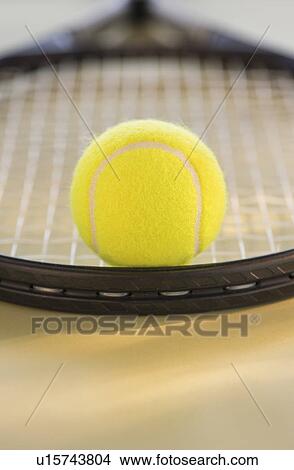 Studio Shot of tennis racket with ball View Large Photo Image Picture - Studio Shot of tennis racket with ball. Fotosearch
