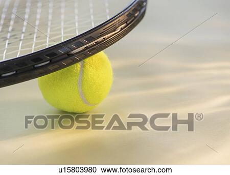 Studio Shot of tennis racket with ball View Large Photo Image Stock Image - Studio Shot of tennis racket with ball. Fotosearch