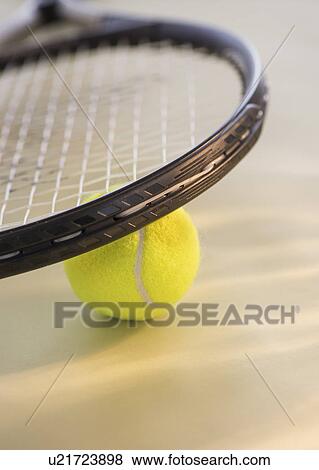 Studio Shot of tennis racket with ball View Large Photo Image Stock Photo - Studio Shot of tennis racket with ball. Fotosearch