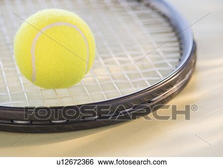 Studio Shot of tennis racket with ball View Large Photo Image Stock Photograph - Studio Shot of tennis racket with ball. Fotosearch