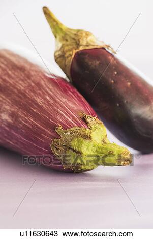 Stock Image - Studio Shot of two eggplants. Fotosearch