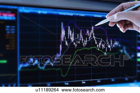 Studio shot of woman pointing at chart View Large Photo Image Picture - Studio shot of woman pointing at chart. Fotosearch