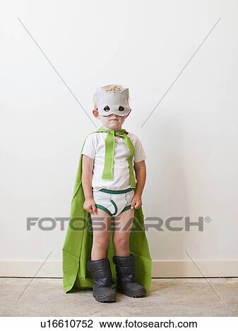 Studio shot, Portrait of boy (2-5 years) wearing green cape and mask View Large Photo Image Stock Image - Studio shot, Portrait of boy (2-5 years) wearing green cape and mask. Fotosearch