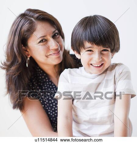 Studio Shot, Portrait of mother and son View Large Photo Image Picture - Studio Shot, Portrait of mother and son. Fotosearch
