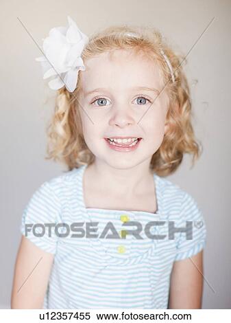 Studio Shot, Portrait of smiling girl View Large Photo Image Stock Photography - Studio Shot, Portrait of smiling girl. Fotosearch