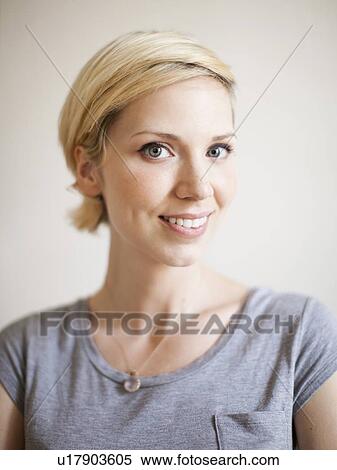 Studio Shot, Portrait of smiling woman View Large Photo Image Stock Photography - Studio Shot, Portrait of smiling woman. Fotosearch