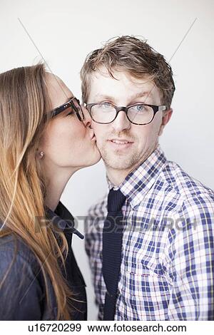 Studio Shot, portrait of young couple View Large Photo Image Stock Photo - Studio Shot, portrait of young couple. Fotosearch