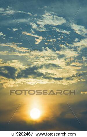 Stock Photo - Sunset sky. Fotosearch