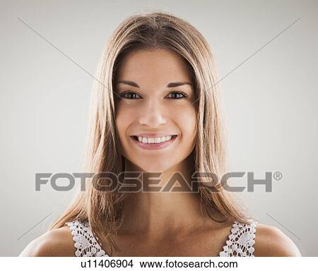 Picture - Sutdio shot of beautiful woman smiling. Fotosearch