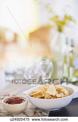 Table with snacks and wine glasses View Large Photo Image Stock Photography - Table with snacks and wine glasses. Fotosearch