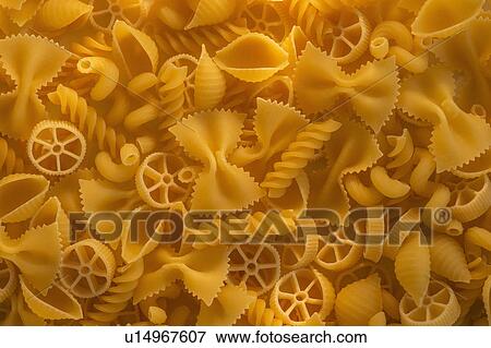 Stock Photo - Variety of yellow pasta. Fotosearch