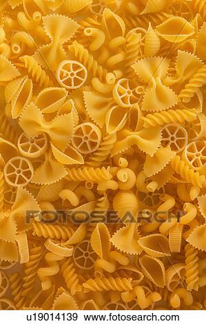 Stock Photo - Variety of yellow pasta. Fotosearch