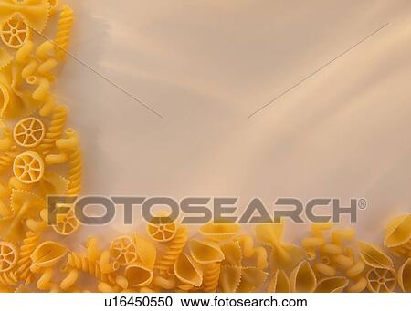 Variety of yellow pasta with blank white space in upper right corner View Large Photo Image Stock Image - Variety of yellow pasta with blank white space in upper right corner. Fotosearch