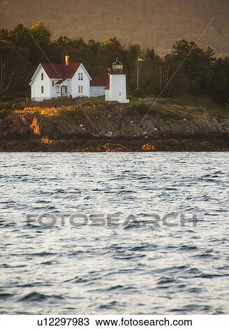View of sea shore with small lighthouse View Large Photo Image Stock Image - View of sea shore with small lighthouse. Fotosearch