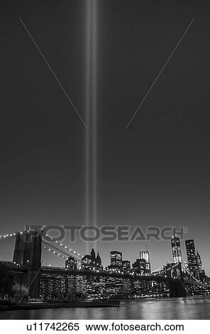 View over Hudson River towards Manhattan with September 11th memorial lights and Brooklyn Bridge View Large Photo Image Stock Photography - View over Hudson River towards Manhattan with September 11th memorial lights and Brooklyn Bridge. Fotosearch