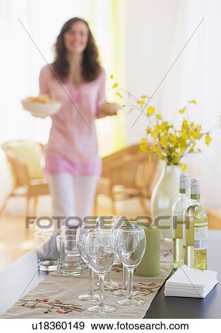 Woman preparing home party View Large Photo Image Stock Photo - Woman preparing home party. Fotosearch