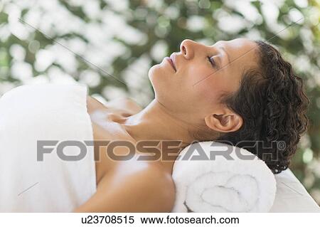 Stock Photography - Woman relaxing in spa. Fotosearch
