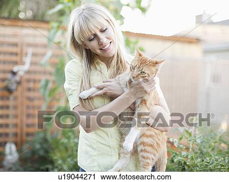 Woman with cat View Large Photo Image Stock Image - Woman with cat. Fotosearch