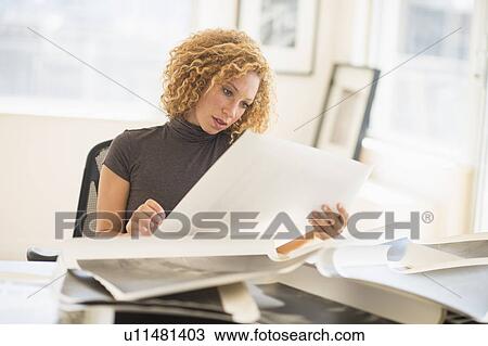 Woman working in art gallery View Large Photo Image Stock Image - Woman working in art gallery. Fotosearch