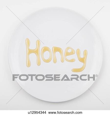 Word HONEY on white plate View Large Photo Image Picture - Word HONEY on white plate. Fotosearch