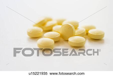Yellow pills, studio shot View Large Photo Image Stock Photography - Yellow pills, studio shot. Fotosearch