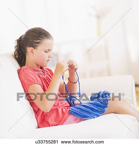 Young girl (8-9) knitting View Large Photo Image Stock Image - Young girl (8-9) knitting . Fotosearch