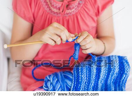 Young girl (8-9) knitting View Large Photo Image Stock Photo - Young girl (8-9) knitting . Fotosearch