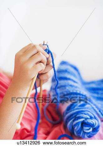 Young girl (8-9) knitting View Large Photo Image Stock Photograph - Young girl (8-9) knitting . Fotosearch