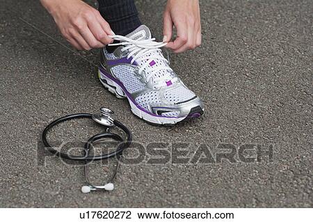 Young woman preparing for healthy sport activities View Large Photo Image Stock Image - Young woman preparing for healthy sport activities. Fotosearch