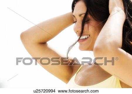 Picture - Young woman smiling. Fotosearch