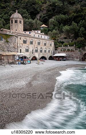 Beach of San Fruttuoso, with view of abbey and beach with sea waves motion blur, Camogli, Liguria, Italy View Large Photo Image Stock Image - Beach of San Fruttuoso, with view of abbey and beach with sea waves motion blur, Camogli, Liguria, Italy. Fotosearch