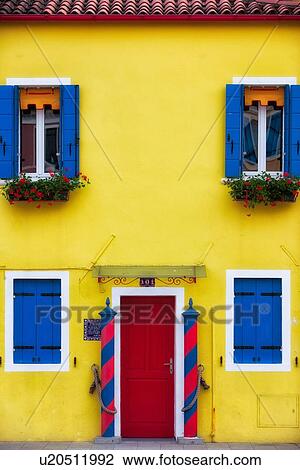 Burano House Facade With Brightly Painted Yellow Wall Red Door