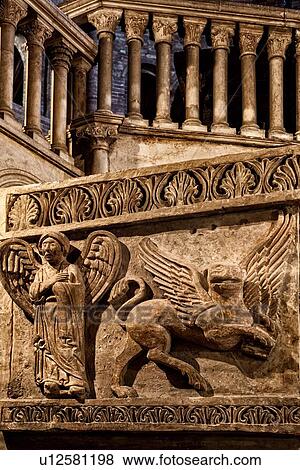 Church complex of Santo Stefano: central pulpit of Romanesque San Sepolcro with carved stone figures of angel and griffin on side, columns above, Bologna, Italy View Large Photo Image Stock Photo - Church complex of Santo Stefano: central pulpit of Romanesque San Sepolcro with carved stone figures of angel and griffin on side, columns above, Bologna, Italy. Fotosearch