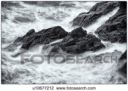 Detail of heavy seas smashing against rocks, with motion blur, monochrome image, Cinque Terre, Italy View Large Photo Image Stock Image - Detail of heavy seas smashing against rocks, with motion blur, monochrome image, Cinque Terre, Italy. Fotosearch