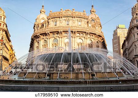 Genoa Piazza Ferrari at sunset: central fountain with motion blur, Baroque buildings, Palazzo della Borsa, with elaborate carved facades behind, Genova, Italy View Large Photo Image Stock Image - Genoa Piazza Ferrari at sunset: central fountain with motion blur, Baroque buildings, Palazzo della Borsa, with elaborate carved facades behind, Genova, Italy. Fotosearch