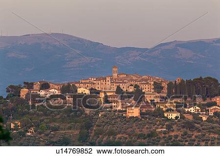 Medieval hilltop town of MonteCastello di Vibio at sunset, with background of hills beyond the Tiber valley, Umbria, Italy View Large Photo Image Stock Image - Medieval hilltop town of MonteCastello di Vibio at sunset, with background of hills beyond the Tiber valley, Umbria, Italy. Fotosearch